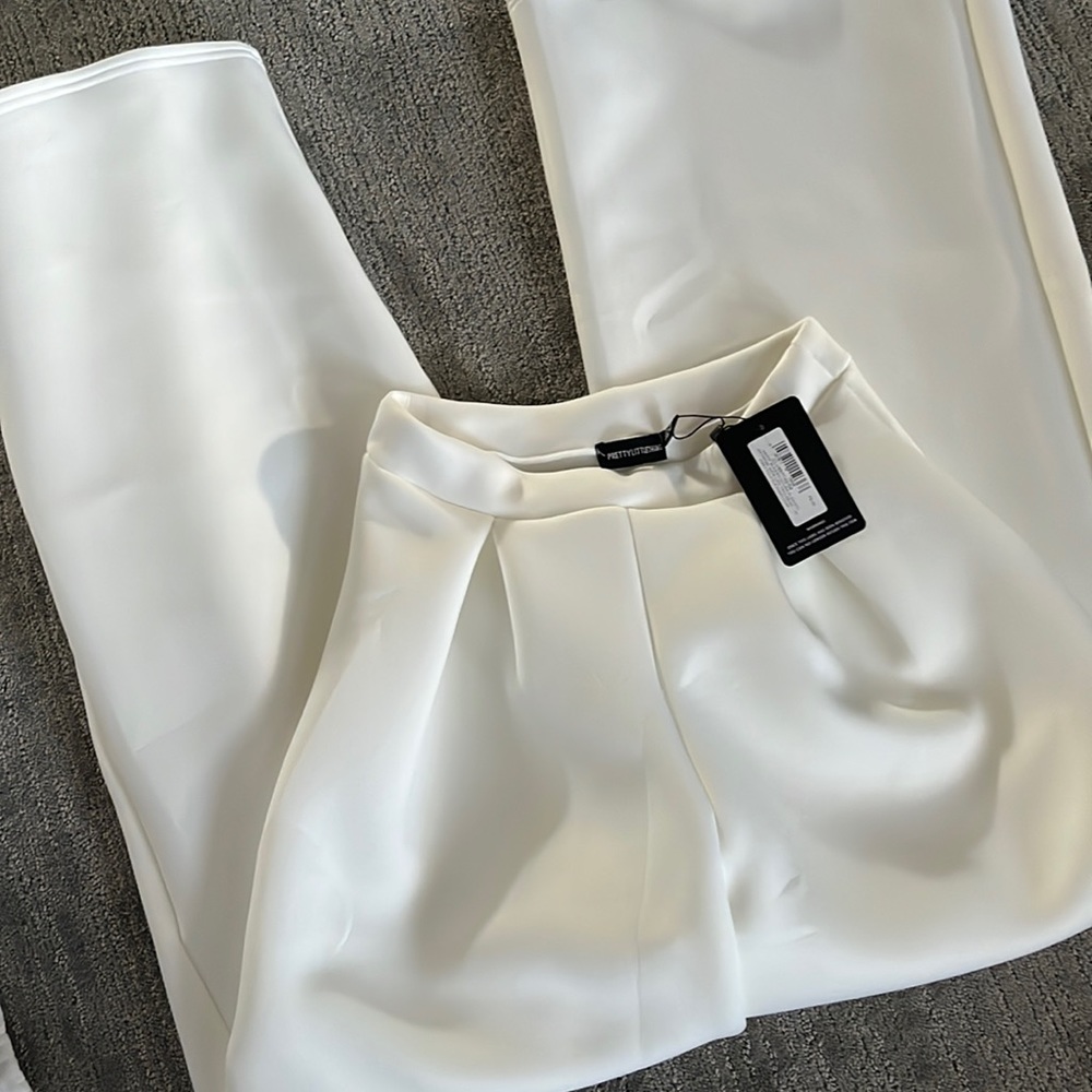 Never worn white wide leg pelted pant!